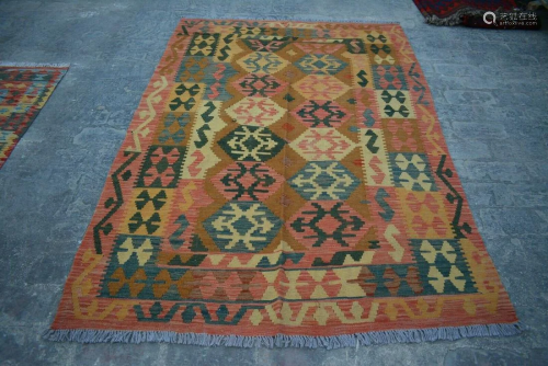 A VINTAGE AFGHANI WOVEN CHUBI RUG.