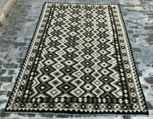 A VINTAGE AFGHANI WOVEN MOROCCAN AREA …