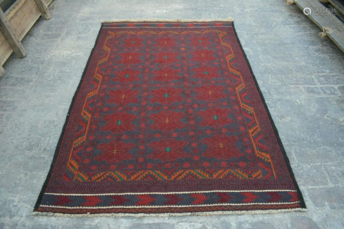 A VINTAGE AFGHANI WOVEN SUMIK RUG.