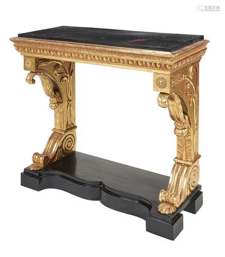 A George IV giltwood and ebonised console table