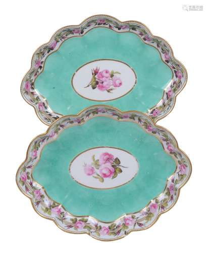 A pair of Derby porcelain lozenge shaped turquoise ground serving dishes painted with pink roses by