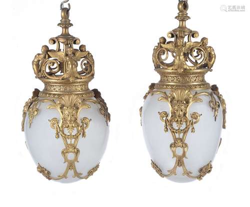 A pair of French opaline glass and gilt metal mounted pendant ceiling lights in Louis XIV taste