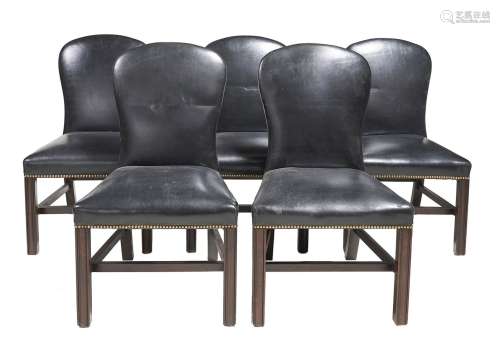 A set of eight mahogany and leather upholstered dining chairs in George III style
