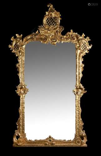 A pair of carved gilt wood overmantel wall mirrors