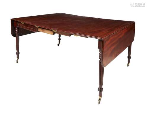 A Regency mahogany extending dining table