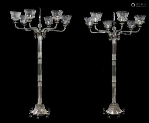 A pair of fine cut glass and silver plated metal mounted six light standard candelabra by F & C Osle