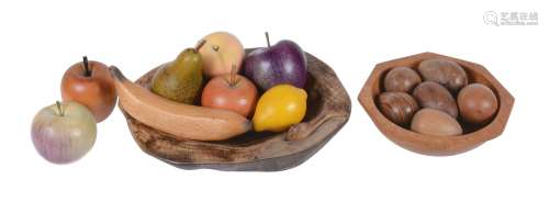 A collection of eight various models of fruit