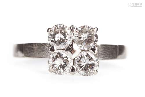 A DIAMOND FOUR STONE RING