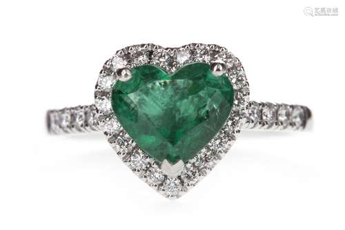 AN EMERALD AND DIAMOND RING