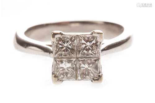 A DIAMOND FOUR STONE RING