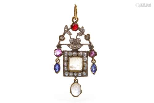 A DIAMOND AND GEM SET PENDANT