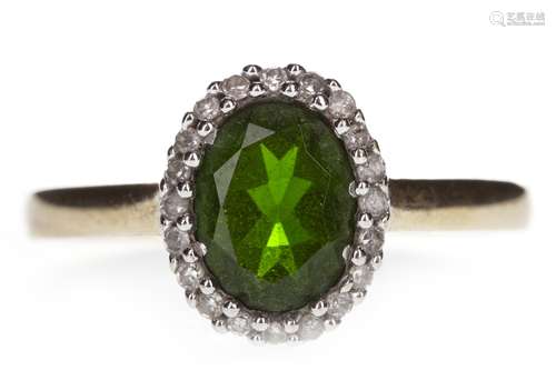 A GREEN GEM AND DIAMOND RING