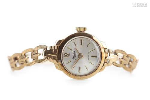 A LADY'S MAJEX GOLD WATCH