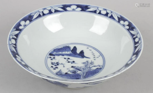 A Chinese blue and white bowl, the footed base …