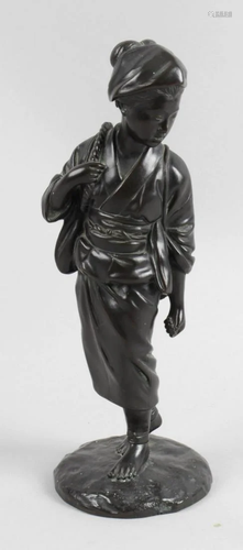 A Japanese bronze figure modelled as a young f…