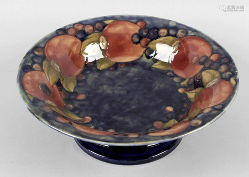 A Moorcroft pottery pedestal bowl, the blue glazed