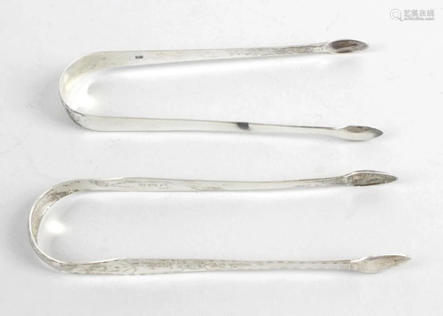 Two pairs of George III silver sugar tongs, the first