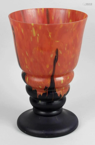 A large orange, yellow and blue mottled glass vase of