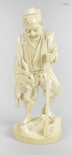 A 19th century carved ivory okimono, modelled as an