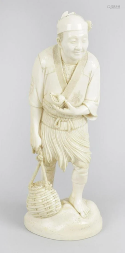 A 19th century carved ivory okimono, modelled as an