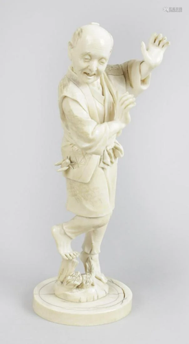 A 19th century carved ivory okimono, modelled as an