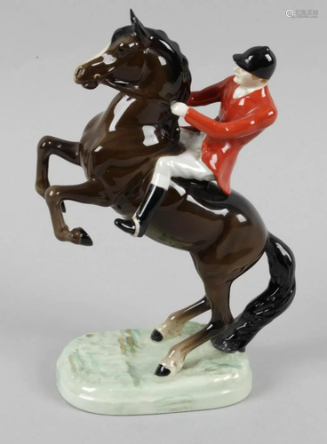 A Beswick ornament, modelled as a huntsman upo…