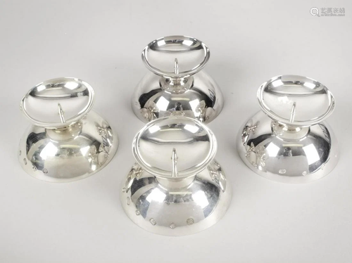 A set of four modern silver combination bowl and