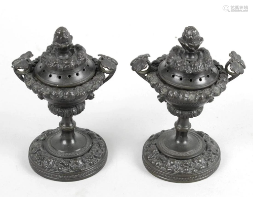 A pair of 19th century bronze potpourri containers,