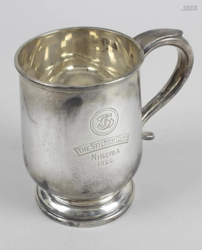 A 1920's silver mug, of plain baluster form with