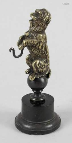 A 19th century bronze pocket watch stand, modelled…