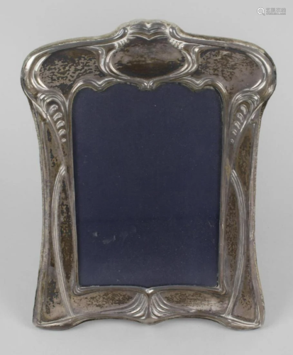 A modern silver mounted photograph frame, of shaped