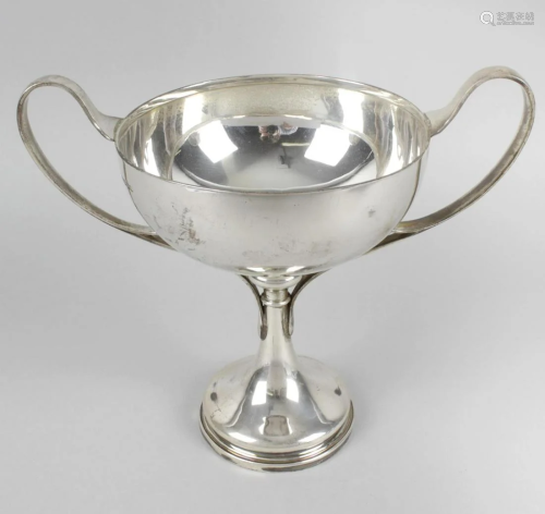 A 1920's silver pedestal cup, the plain circular bowl
