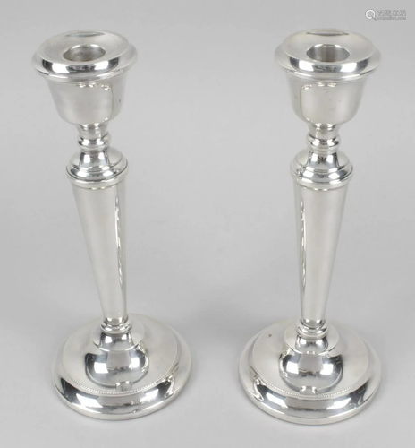 A pair of modern silver mounted candlesticks, each …