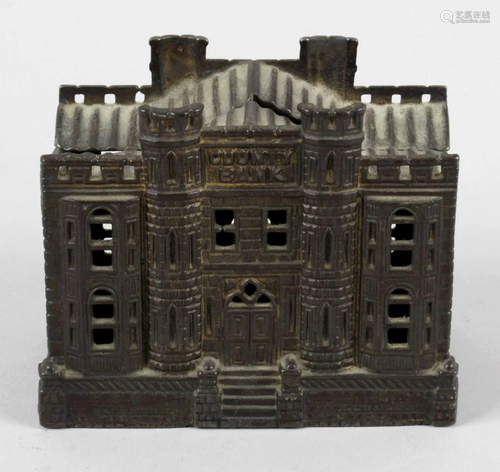 A 19th century cast iron novelty money box, modelled as