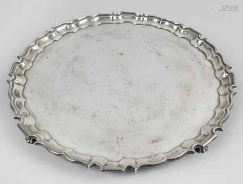 A modern silver salver, of plain circular form with pie