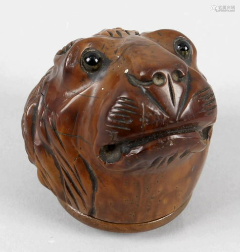 An early 19th century carved fruit wood snuff box,