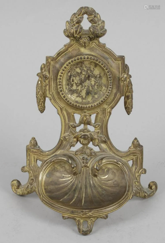 A late 19th century gilt cast pocket watch stand of