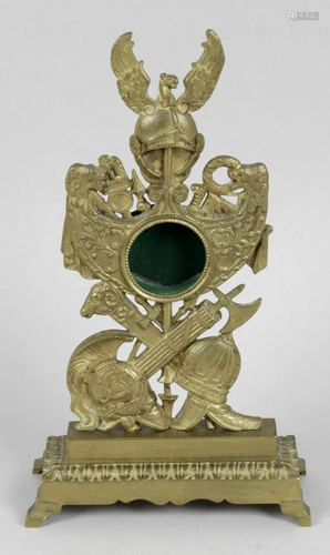 A late 19th century gilt metal pocket watch stand, the