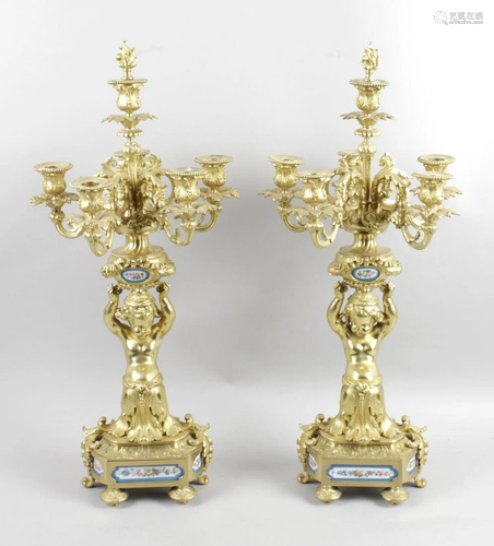 A pair of 19th century gilt ormolu candle holders, e…