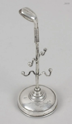 An Edwardian silver ring stand, the filled circular