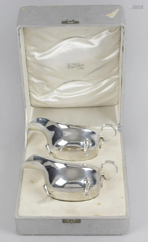 A pair of 1930's silver sauce boats, each of typical