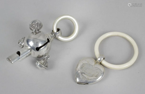 A child's silver rattle and whistle, of spherical form
