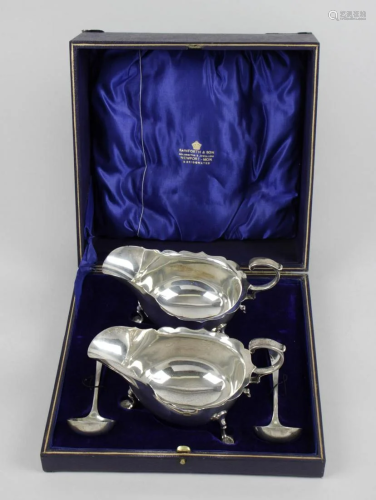 A pair of Edwardian silver sauce boats, each of ty…