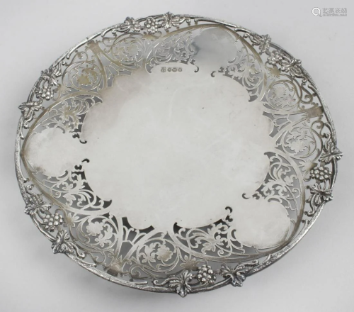 A small modern silver dish, of circular form with