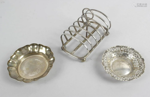 A small selection of silver items to include a seven