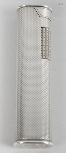 A silver Dunhill cigarette lighter, of slender form