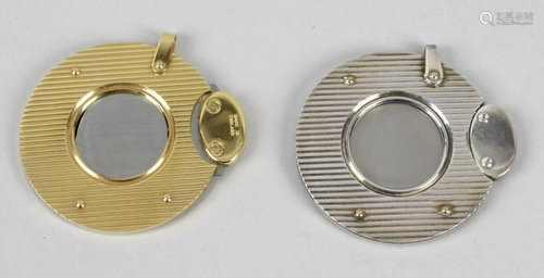 Two Dunhill cigar cutters, the first gold plated