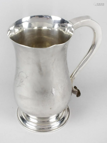 A George III plain silver pint mug, the slender