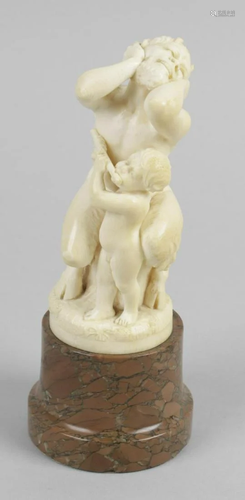 L Kuchler, a 19th century carved ivory figure group,