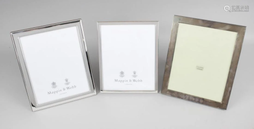 Four large modern silver mounted photograph frames,